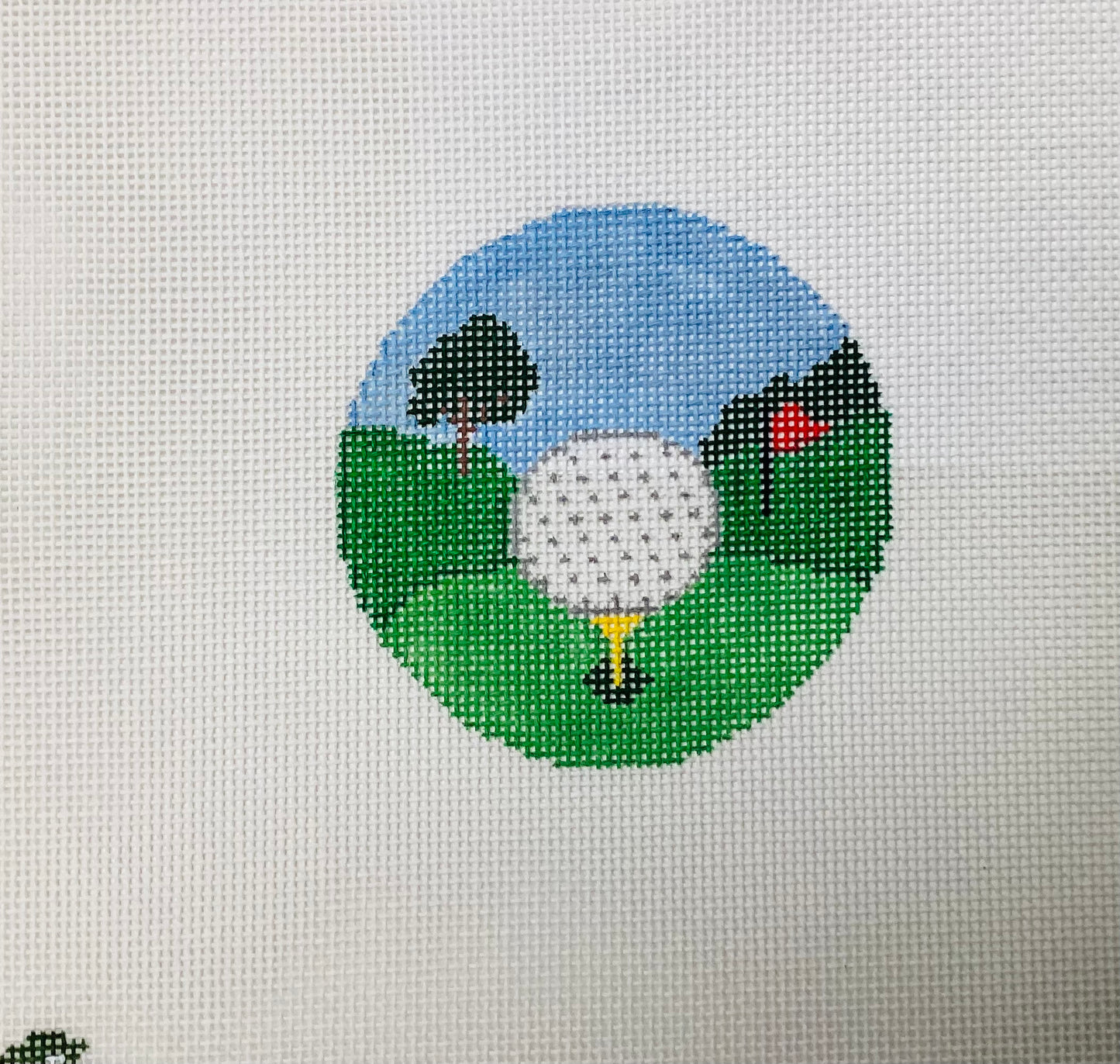 Golf Ball on Tee with red flag