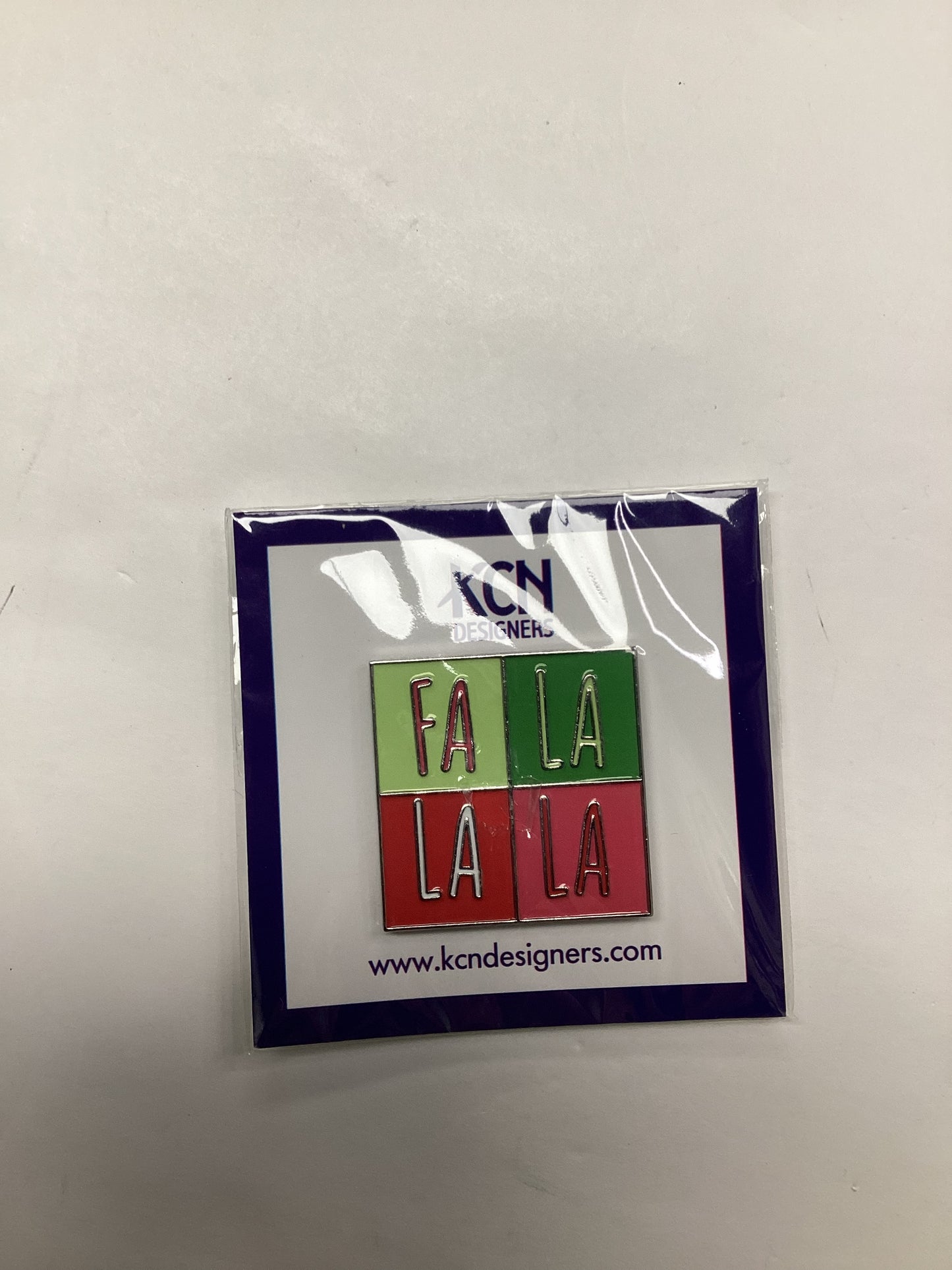 Fa La La - kcn- Needleminder