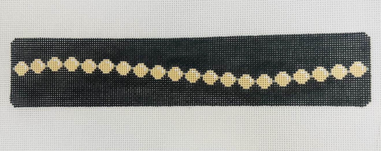 pearls on black bracelet