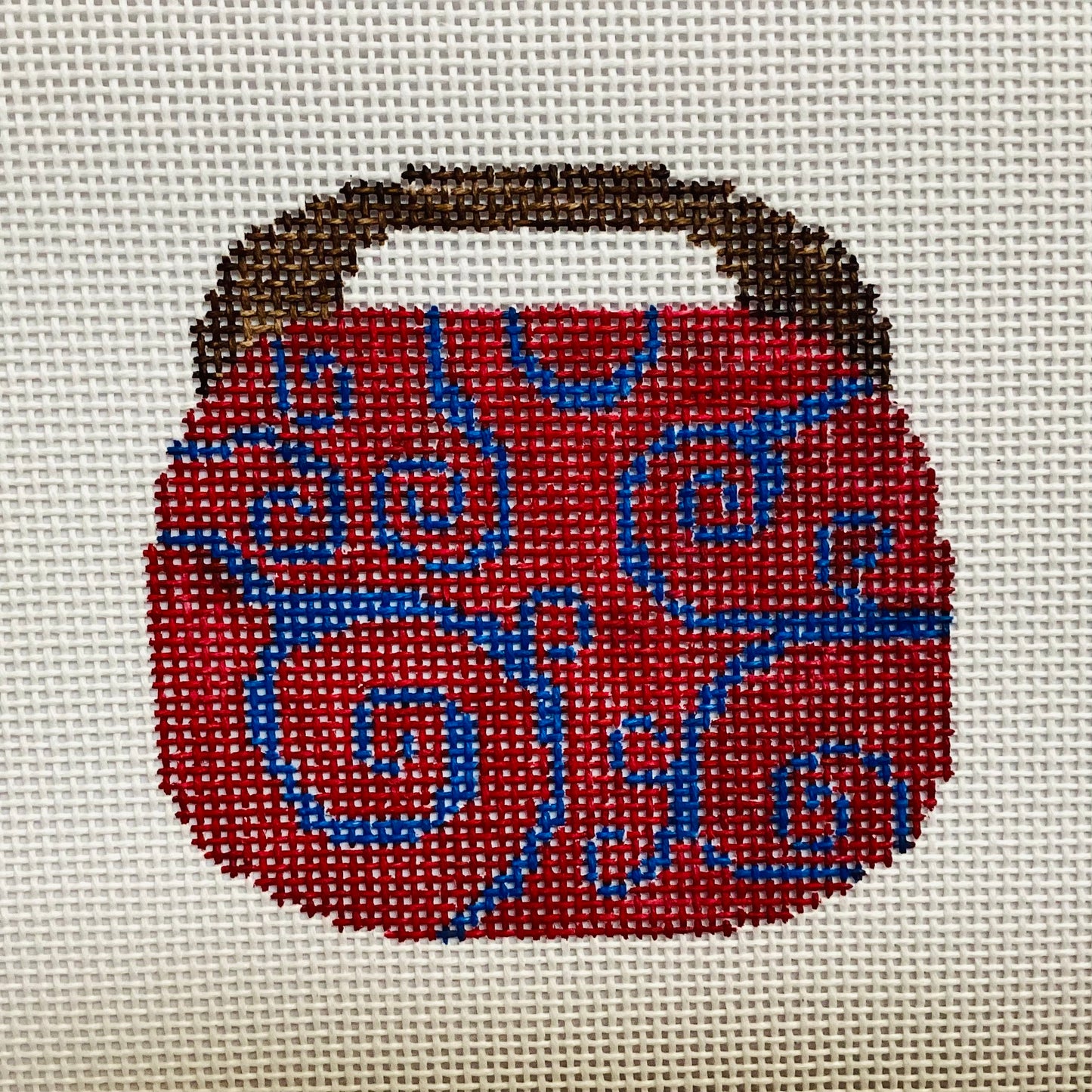 Purse ornament red with blue design