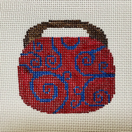 Purse ornament red with blue design