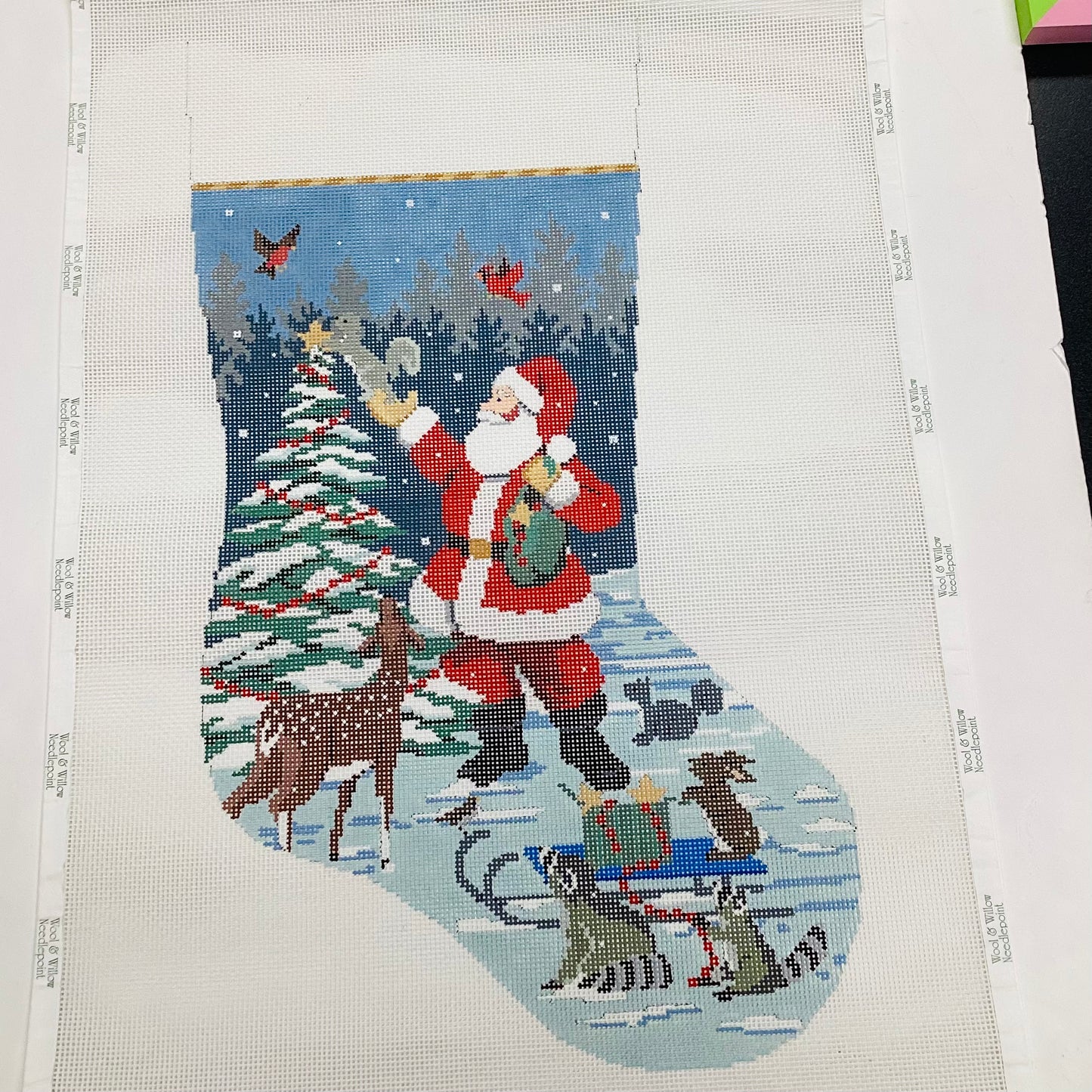 Topping the Tree Needlepoint Stocking